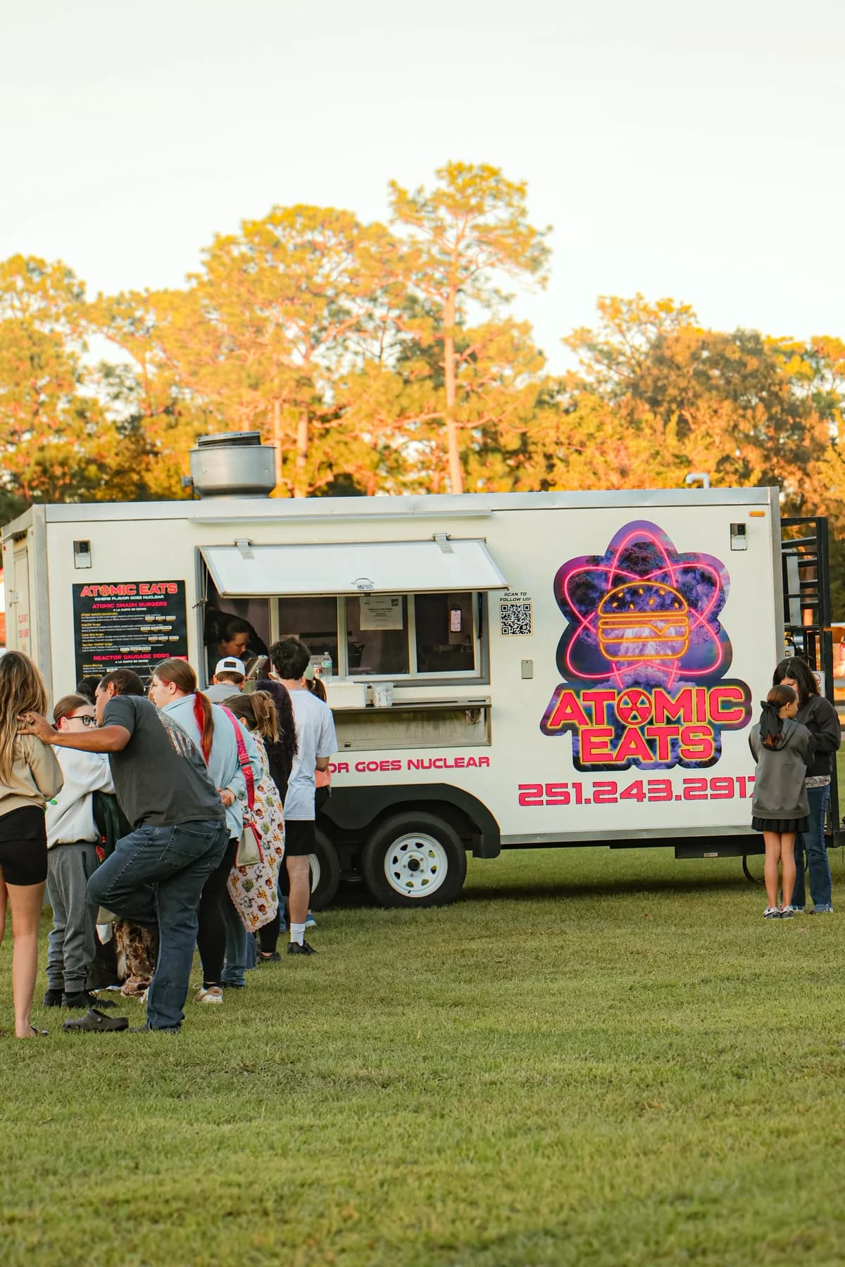 Atomic Eats serving customers at OpenTruck’s family movie night